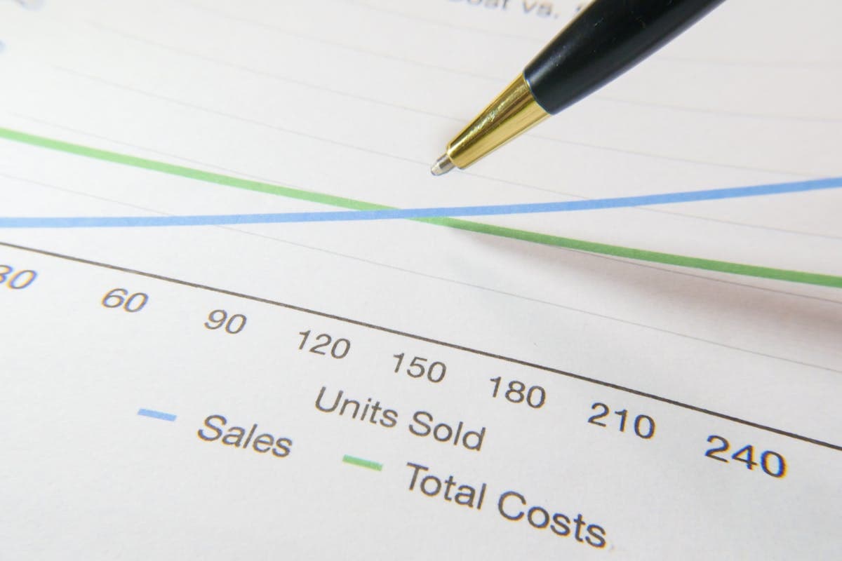 Enterprise team reviewing budget and cost breakdown for AI data collection program