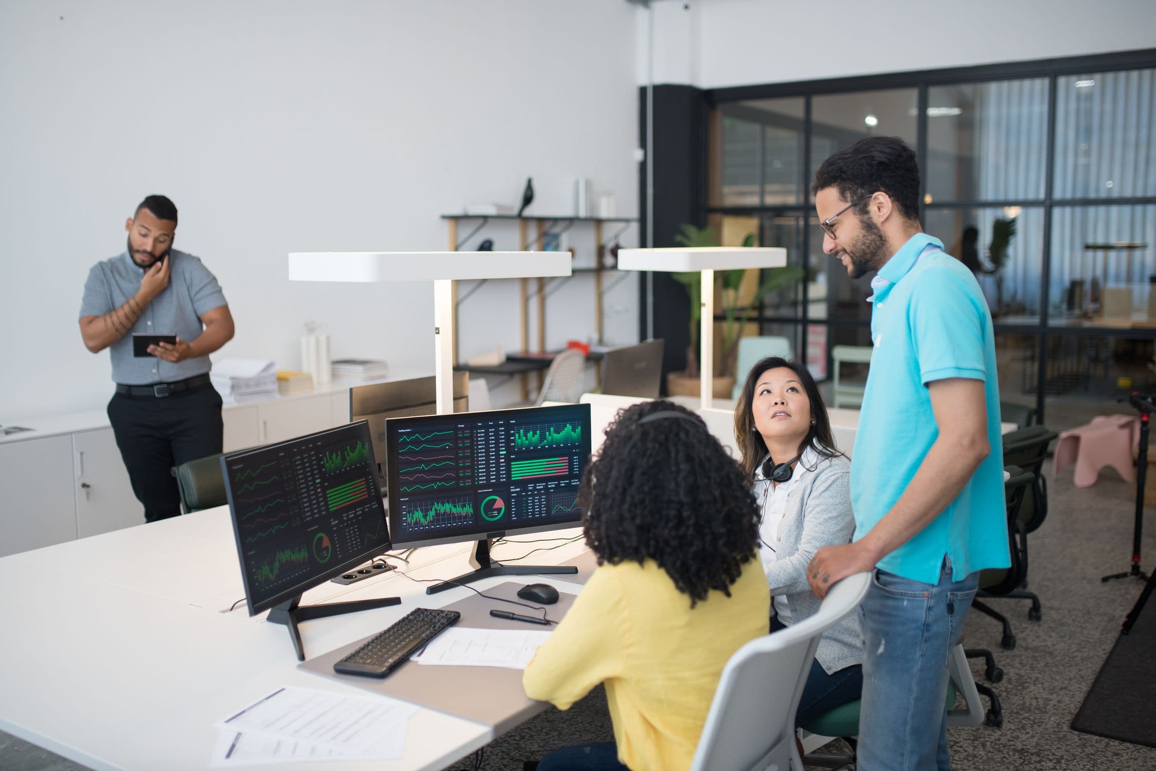 Data annotation team collaborating in a modern office environment - representing enterprise AI training data production in Asia-Pacific