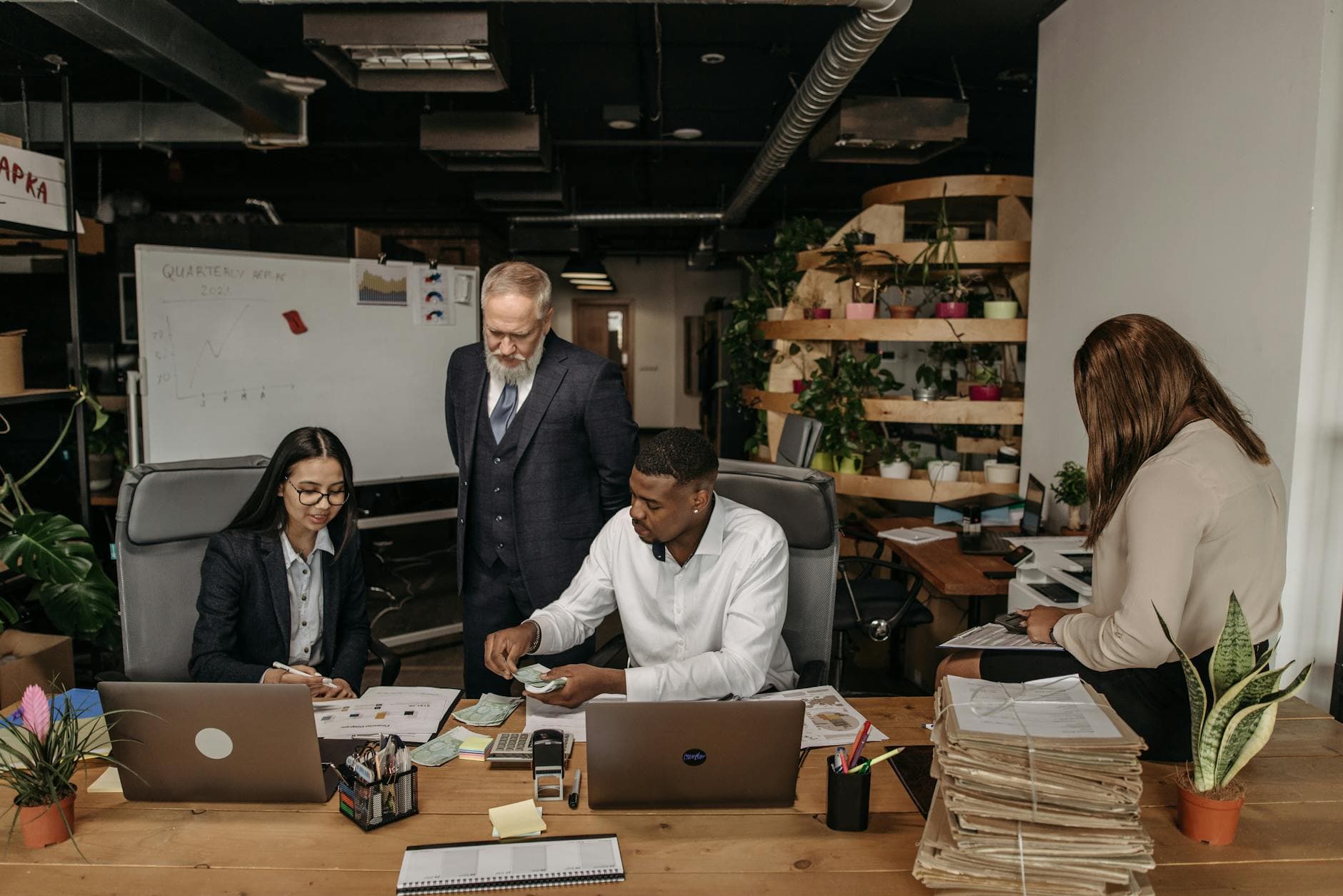 Data annotation workforce models – managed annotation team working at desks in a modern office