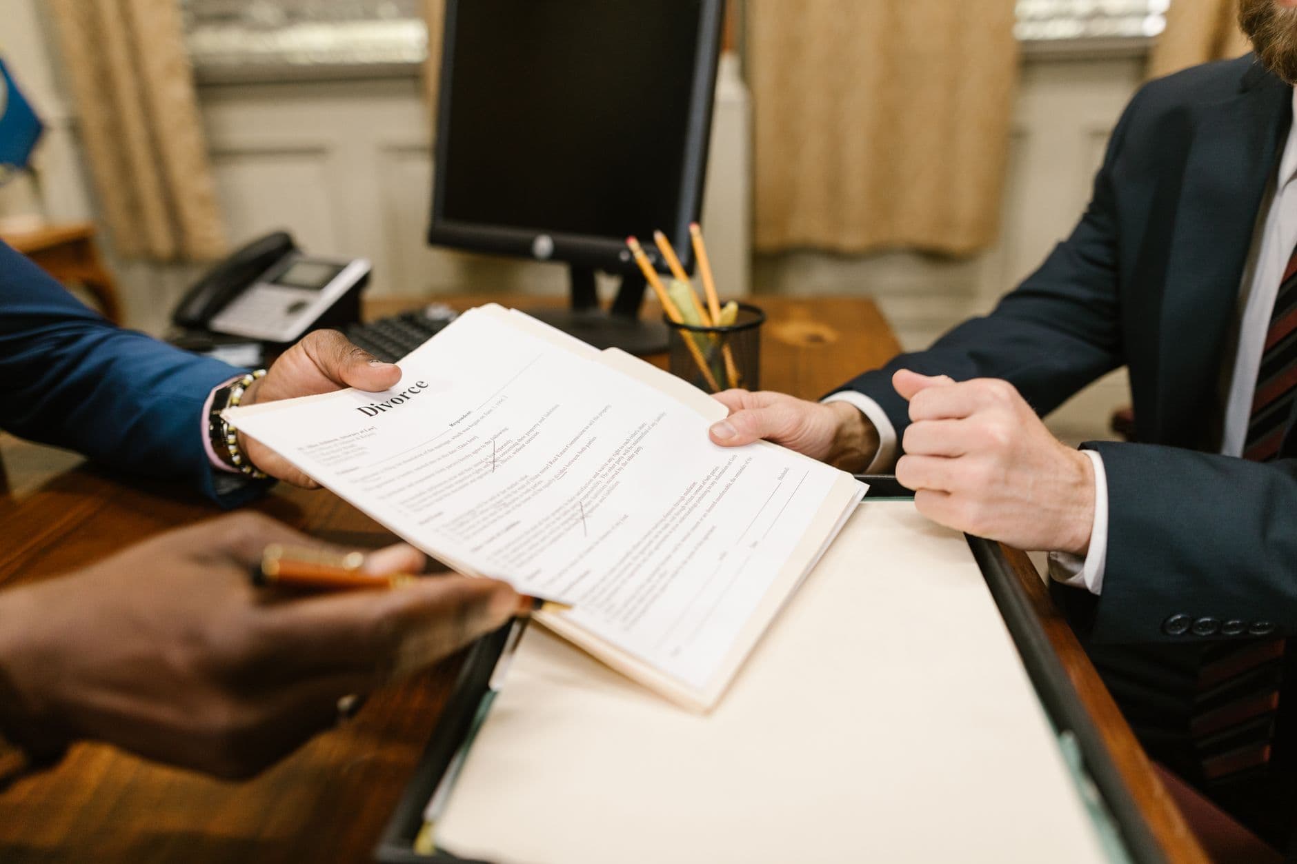 Legal document annotation for AI training – lawyer reviewing contracts with NLP annotation overlay