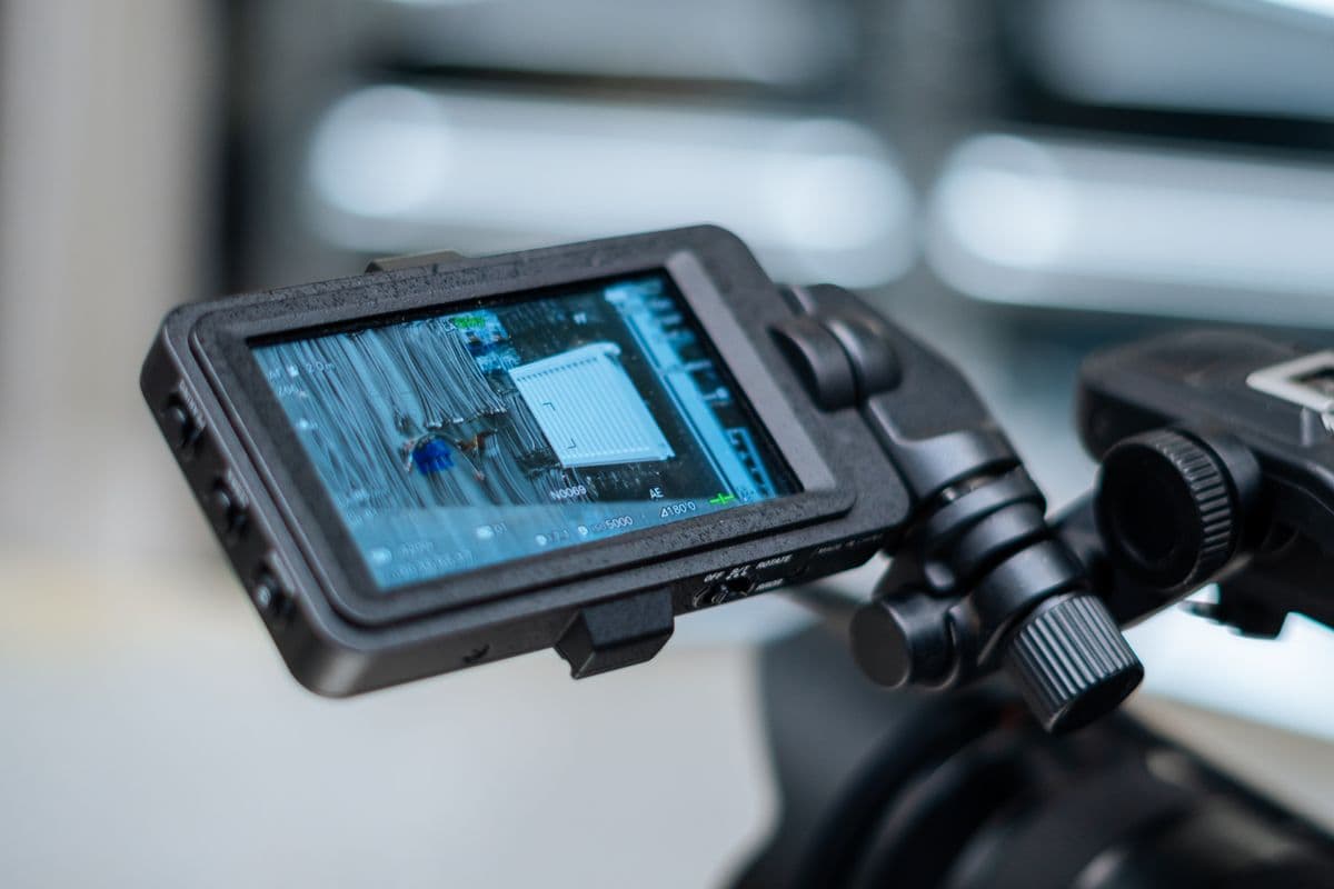 Camera monitor displaying recorded footage during review, representing video data quality assurance before a training dataset ships